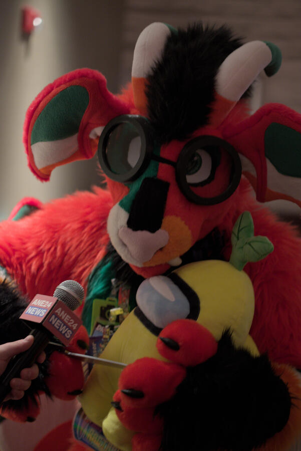 Ragtravise Furlance holding an amogus hostage at ANE 2025